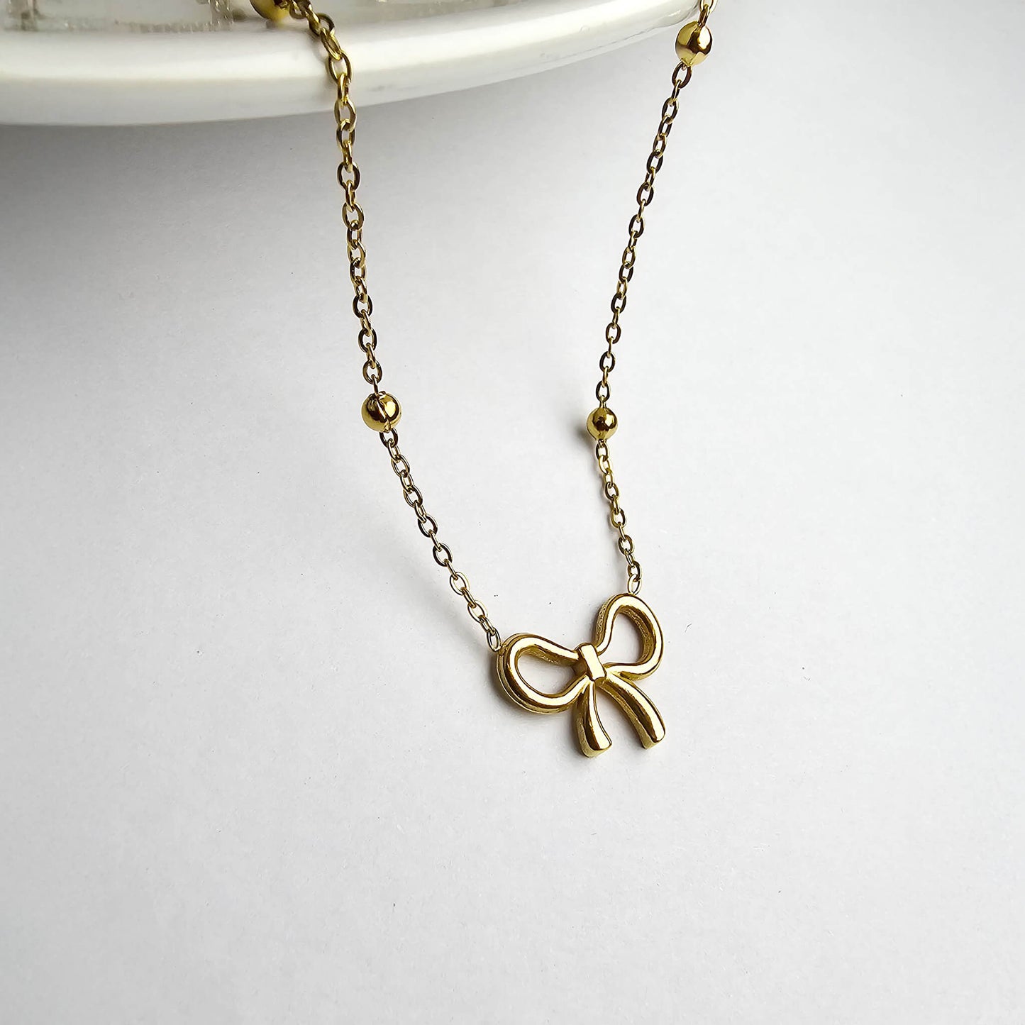 Anti-Tarnish Elegant Infinity Bow Pendant under 500