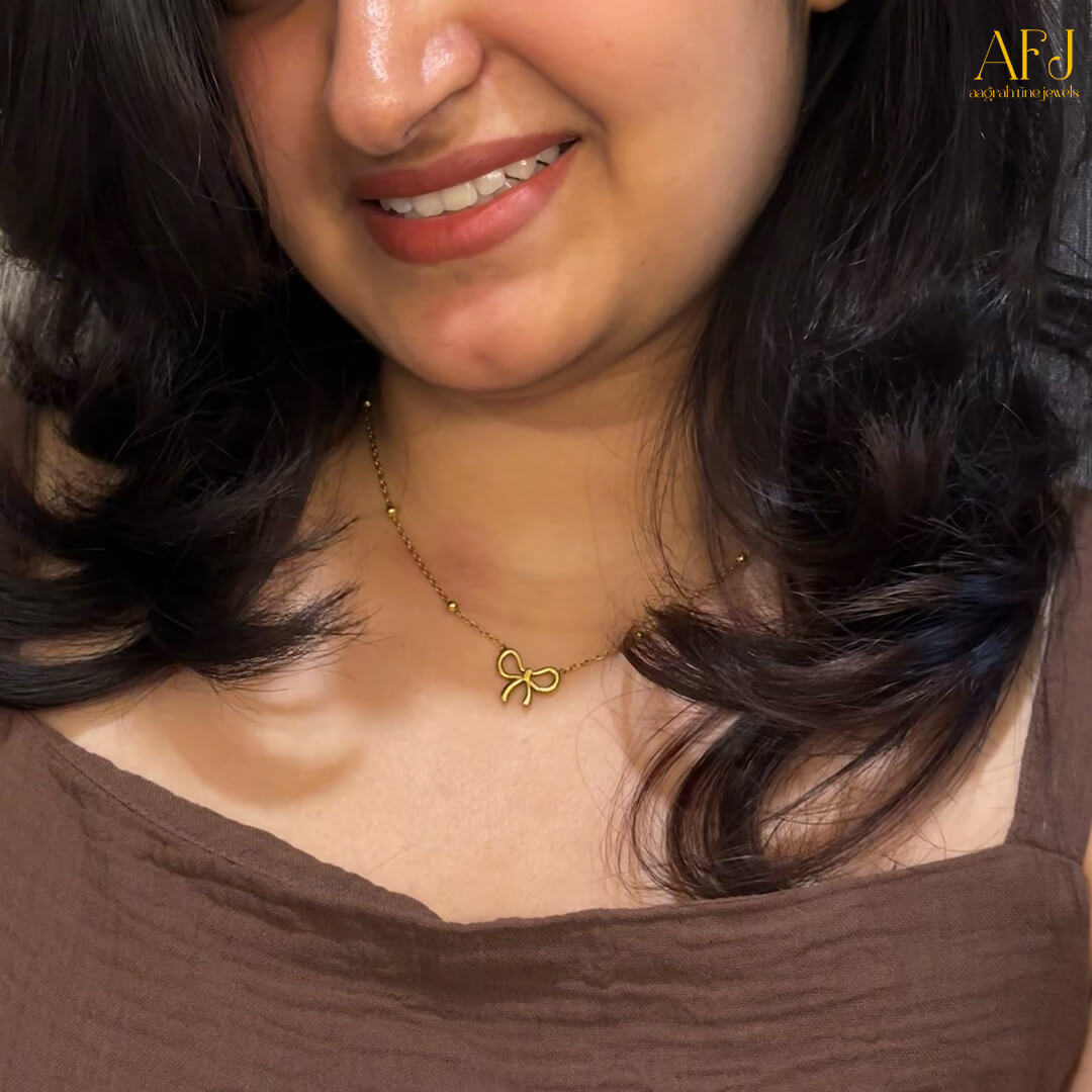 The Elegant Infinity Bow Pendant Necklace