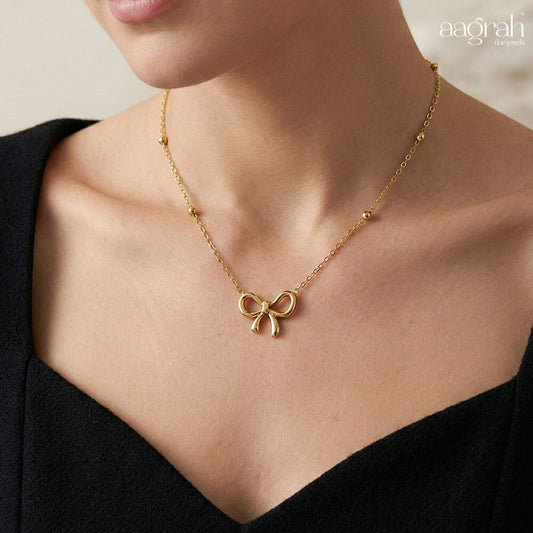 The Elegant Infinity Bow Pendant Necklace