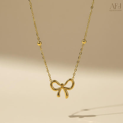 The Elegant Infinity Bow Pendant Necklace