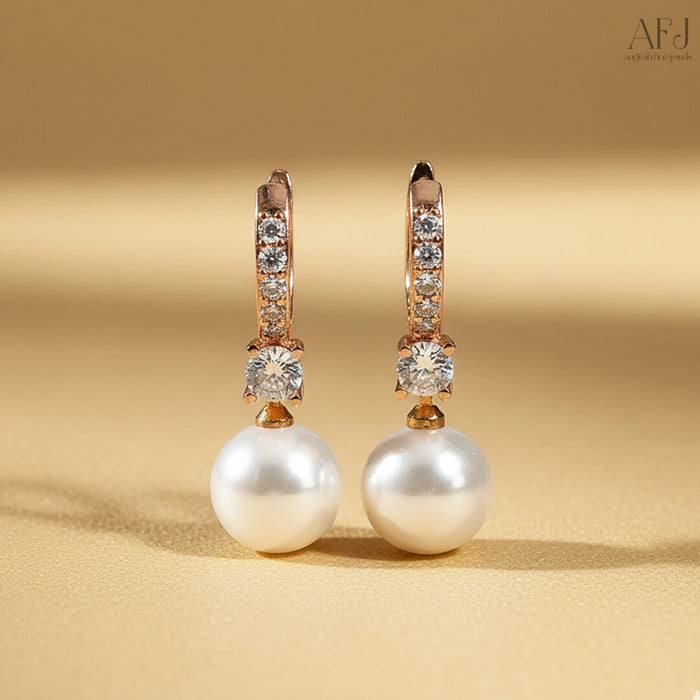 The Rose Gold Pearl Drop Hoop Earrings