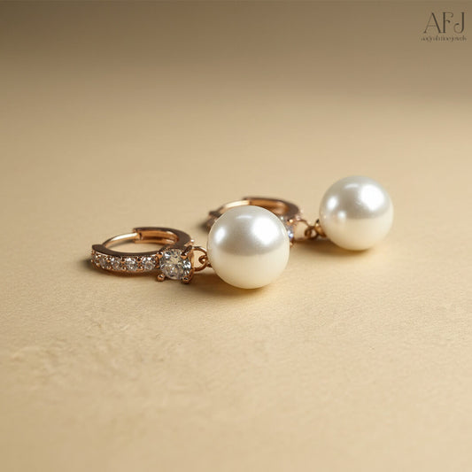 The Rose Gold Pearl Drop Hoop Earrings