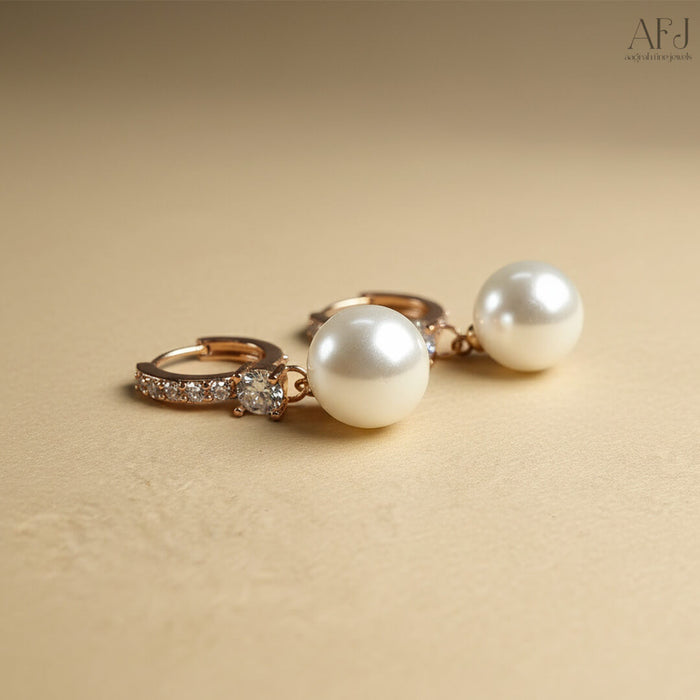 The Rose Gold Pearl Drop Hoop Earrings